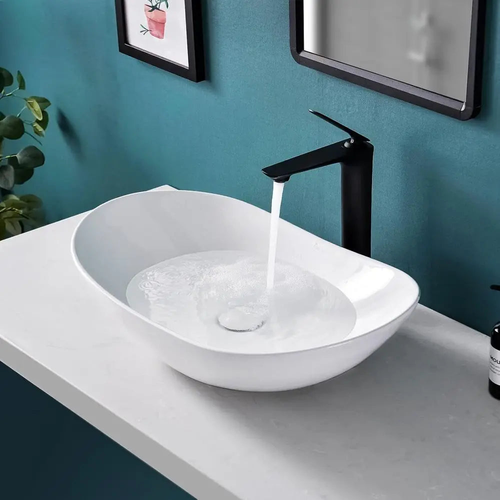 Ceramic Oval Vessel Sink With Pop Up Drain Above Counter